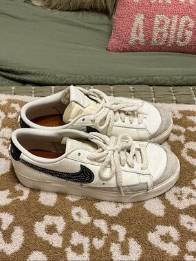 Nike Kids White Sneakers with Black Swoosh